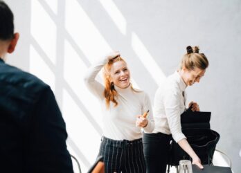 Image of two women in the workplace